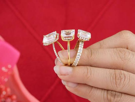 Engagement rings held up for selection